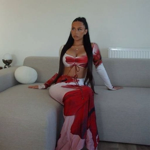 Women's two-piece floral print set with drawstring long sleeve crop top and matching maxi skirt