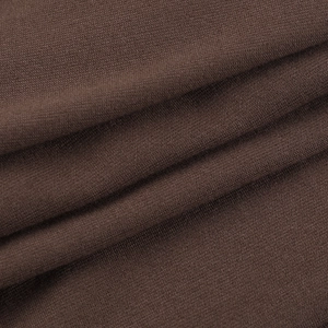 Macro detail of dark brown fine knit fabric showing soft texture and draping