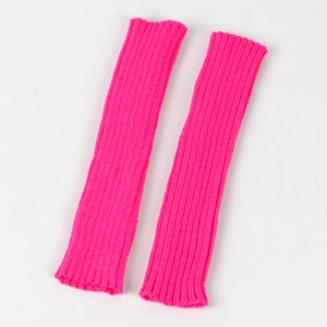 Macro shot of neon pink ribbed knit arm warmers in a soft elastic acrylic blend