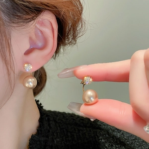 Elegant champagne pearl jacket earrings with sparkling cubic zirconia gold studs