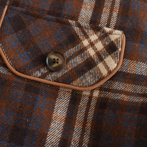 Vintage plaid wool jacket featuring brown buttons and high-quality textured pocket details