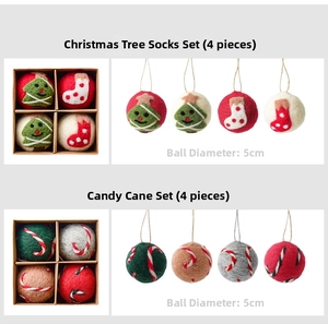 Detail of 5cm handmade wool felt Christmas balls with festive tree and candy cane patterns