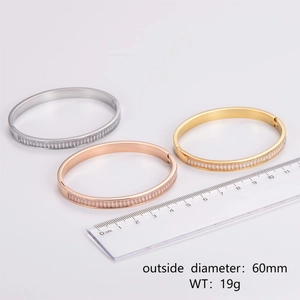 Three-color stainless steel bangles with zircon inlay in silver, gold, and rose gold