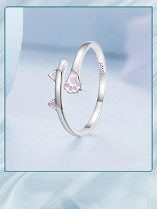 Close-up of S925 hallmark on silver cat ring with pink enamel paw and ear details