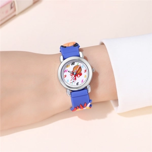 Close-up of children's blue basketball watch with flame pattern on a child's wrist