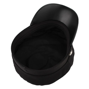Detail showing the inner lining and faux leather brim of the black baker boy cap