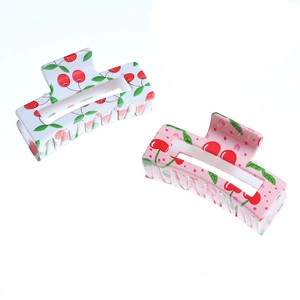 Glossy cherry print hair claw clip in white and pink acrylic for women's updos