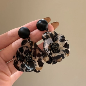Retro leopard print resin flower petal earrings with a matte black stud and gold rose core