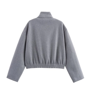Back view of grey cropped zip-up jacket with stand collar and elastic waist hem