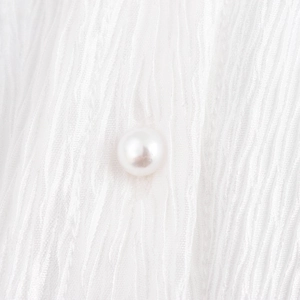 White textured button-up shirt with premium pearl button and delicate 3D floral accent