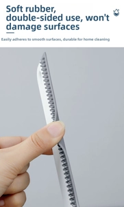 Nahaufnahme der flexiblen Textur eines grauen und weißen Gummischaber-Werkzeugs.