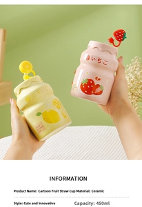 Detail of 450ml ceramic fruit themed straw mugs in strawberry and lemon designs