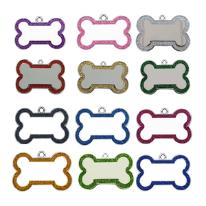 Custom bone-shaped pet ID tags in 12 colors with glitter border and engravable surface