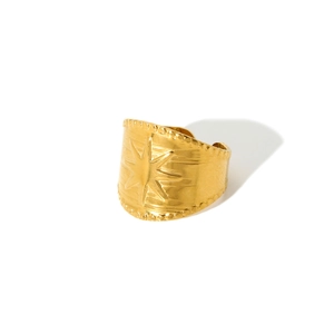 Detailed close-up of 18K gold-plated irregular geometric ring with star engraving