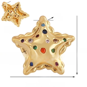 Macro shot of gold star charm with colorful stones showing front and back hollow details