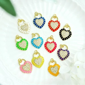 Macro detail of colorful enamel heart lock charms with micro-pave cubic zirconia accents