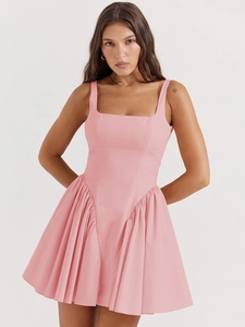 Detail of a pink backless mini dress featuring a square neck and ruffled hemline