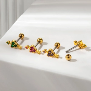 Golden heart-shaped cartilage studs with colorful zircon wings and ball screw backs