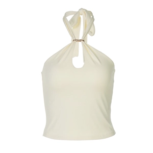 Detail of cream halter top featuring a central gold metal ring and soft elastic fabric
