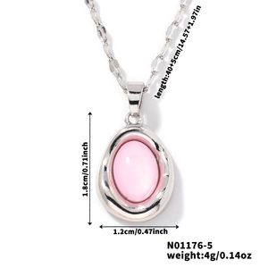 Detail view of silver necklace featuring pink oval pendant with dimensions 40+5cm and 1.8x1.2cm