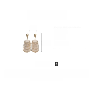 Detail of gold fan-shaped tassel earrings made of copper, size 8.5cm by 3cm