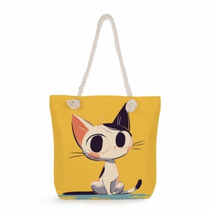 Vibrant yellow canvas tote bag with cartoon cat print and durable cotton rope handles