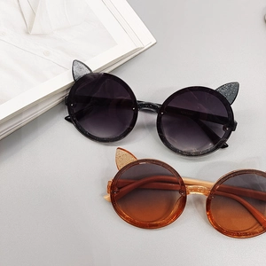 Kids cat-ear sunglasses with glitter frames and UV protection in black and amber colors