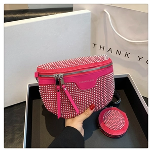 Detail of rose red studded crossbody bag with round coin purse and silver metallic rivets