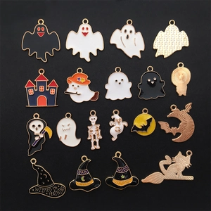 Set of 16 assorted Halloween enamel charms with ghosts, castles, and witch hats