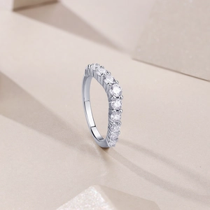 Detail of S925 silver ring featuring nine round sparkling cubic zirconia stones