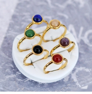 Set of 18K gold plated thin titanium rings with various colorful natural stone inlays