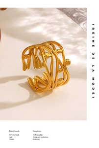Detail of 18K gold plated stainless steel multi-layer wave ring with small bead accents
