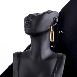 Golden titanium steel twist square earrings on model with 2.9cm total length