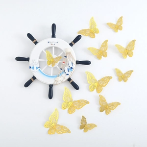 3D hollow gold butterfly wall stickers with Mediterranean steering wheel decor