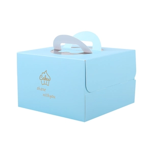 Thick light blue paper cake box with top handle, clear window and gold foil typography