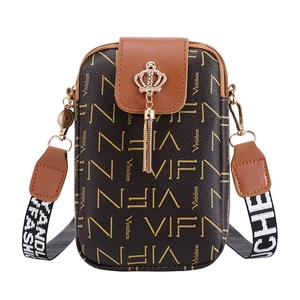 Brown printed PU leather crossbody phone bag with tassel and patterned wide strap