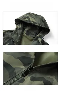Detail of camouflaged jacket hood with adjustable drawstrings and durable black zipper