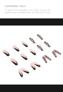 Long coffin fake nails featuring leopard print, black French tips and tiny rhinestones