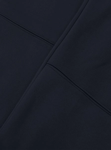 Detail shot of navy blue heavy fleece fabric texture and durable stitching on cargo pants