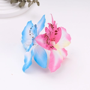 Bohemian hair clip with dual gradient orchids and pearl accent for beach vacations