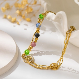 Double-layered gold titanium bracelet featuring colorful beads and Tree of Life charms