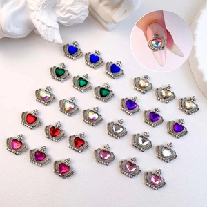 Luxurious crown nail art charms with colorful heart crystals in various metallic finishes