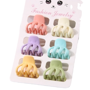 Set of 6 colorful matte octopus hair clips for women in macaron shades on card