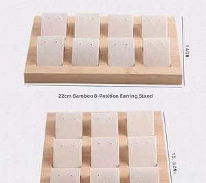 Bamboo 8-slot earring display stand with soft beige leatherette texture pads