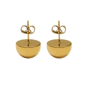 Macro detail of high-polish golden hemispherical earrings with butterfly backs