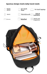 Spacious interior of waterproof oxford backpack with slots for laptop and DSLR camera