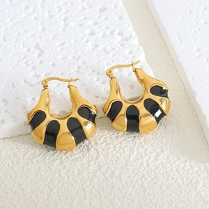 Elegant gold plated stainless steel fan shaped earrings with black enamel on white stone