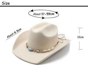 Close-up of bohemian beaded band with turquoise beads and shells on a beige wool cowboy hat