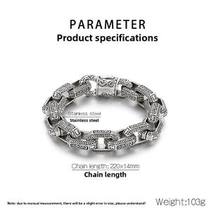 Close-up of vintage steel chain bracelet with detailed geometric engravings and specs