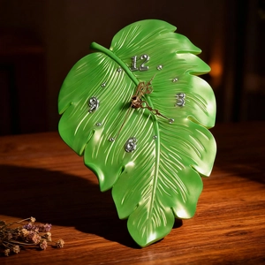 Tropical monstera leaf desk clock with green resin texture and gold metal hands